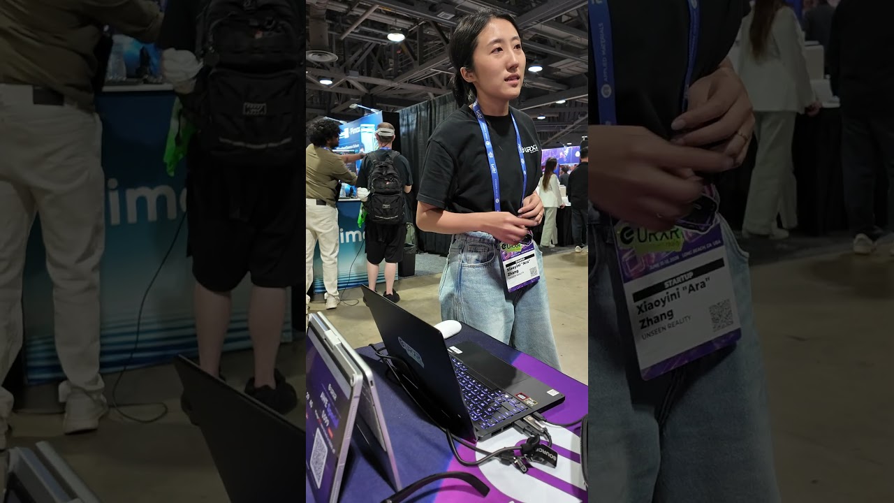 Video thumbnail showing the Unseen Reality booth at AWE 2026 with a URXR One demo unit tethered to a laptop