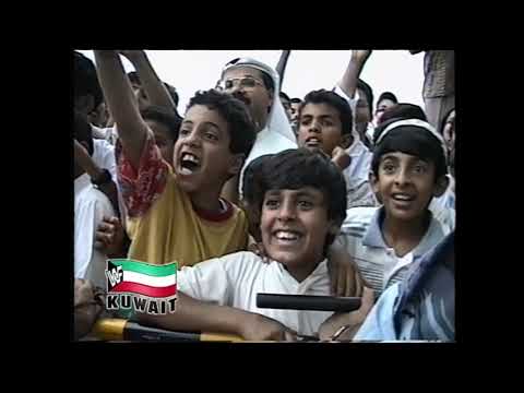 WWF show footage from Kuwait. British Bulldog jumps WWF Champ Shawn Michaels at the Beach! (WWF)