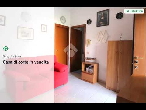 RHO CENTRO - In corte 2 locali con box doppio.