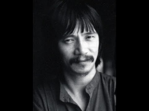 Tôi đứng trên đồi mây trổ bông - Lê Uyên