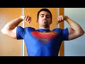 Muscle god flexing in tight shirt
