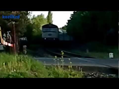 749 107-9 V čele R1255 na přejezdu v Příbrami