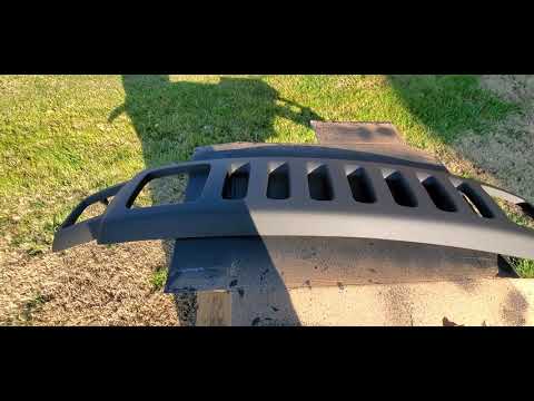 Spraying Dupli-Color on Hummer H3 grill.