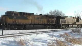 preview picture of video 'CNW 8822 UP 7156 2-09-03 Junction City, WI.'