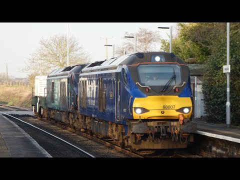 DRS 68007 and 68002 slowly head through Westerfield working 6L70 3/3/22