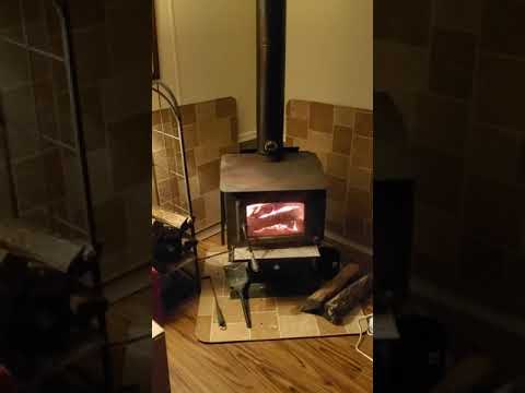 Pleasant Hearth Wood Stove Comfortable off grid living.