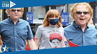 Simply Red&#39;s Mick Hucknall, 61, and daughter Romy, 14, walk in London58 792427