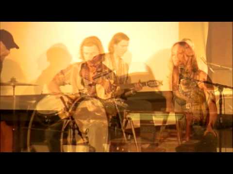 "Tell Me" performed by Lisbeth Scott