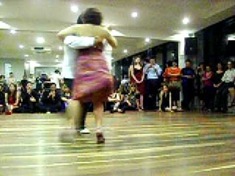  Corina de la Rosa  and  Julio Balmaceda  are  dancing  to  the  vals  "  Pobre Flor  "