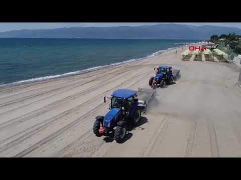 Beach L and M Models with Tractor Towed Beach Cleaning Machines are cleaning the touristic beaches.