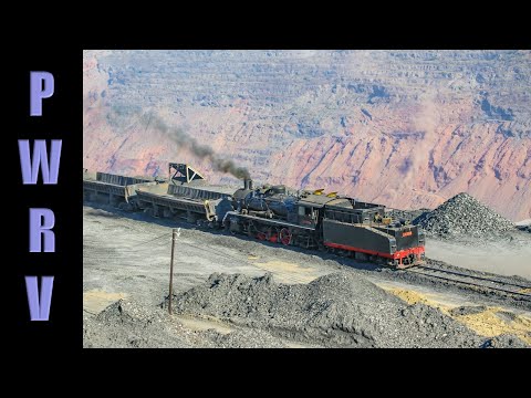 Chinese Railways - Fuxin's 2-8-2 SY Steam Locomotives Work Spoil Trains Into the Huge Old Coal Pit