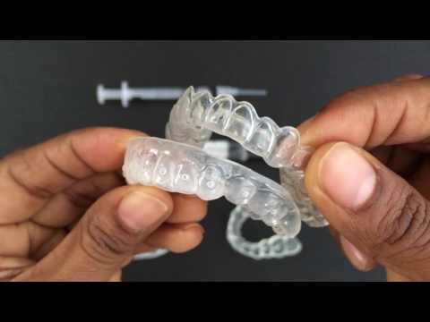 Part of a video titled How to use Tooth Whitening Trays - YouTube