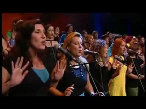 Amazing choir Perpetuum Jazzile performs Toto's Africa and uses there hands to simulate storm