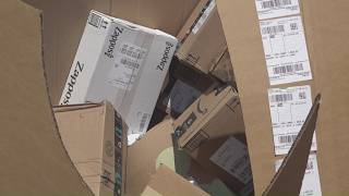 Postal employees speak of long hours, strain on the system amid difficult summer