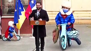 Kid ‘Superman’ Bikes Around President During Speech in Chile