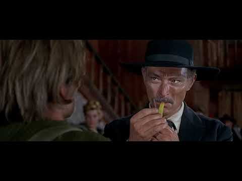 For a few dollars more (1965). Mortimer (Lee Van Cleef) lights a match on Juan Salvaje's back