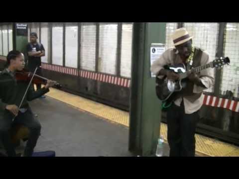 Wrecking Ball IN THE SUBWAY (Violin guitar By Guitaro 5000 and Najee. lyrics) Miley Cyrus cover