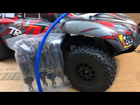 How to PREVENT Your Traxxas Slash 2wd from ROLLING!! NEW SHOCKS AND FUEL LINE HACK TO PREVENT ROLL!