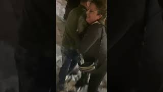 Drunk man attempts to climb small pile of snow