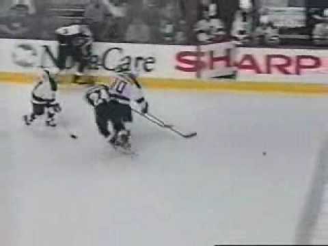 Erik Rasmussen Big Hit on Kapenen Apr 8, 2004