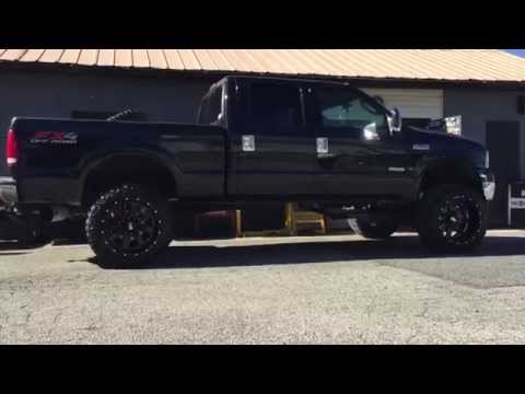 Moto Metal M0962 22"x14" Wheels on Stretched Nitto Tires - Lifted Ford F-250 Super Duty