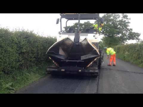 Machine Laying Asphalt 3