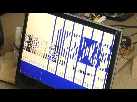 Running Computer vs Tesla Coil!