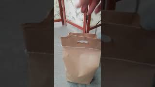 Cerrado y costura de bolsas de papel para empacar carbon con asa