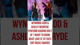 Wynonna Judd &amp; Ashley McBryde Perform Soaring Duet of ‘I Want to Know What Love Is’ at 2023 CMT