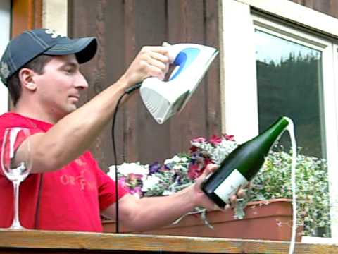 Who Knew Opening Champagne With A Glass Looked So Suave?