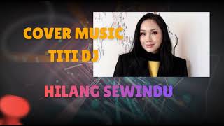 Download lagu Titi DJ - Hilang Sewindu - Lirik Music mp3