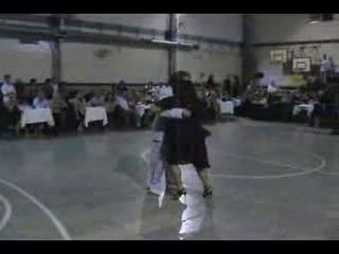  María del Carmen Romero  and  Jorge Dispari  are  dancing  to  the  milonga  "  Milonga De Los Fortines  "