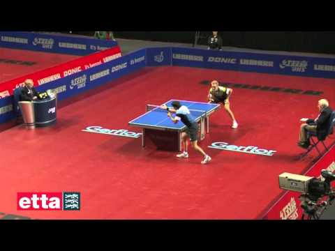 Timo Boll in a close encounter with Adrien Mattenet  - LIEBHERR Men's World Cup 2012