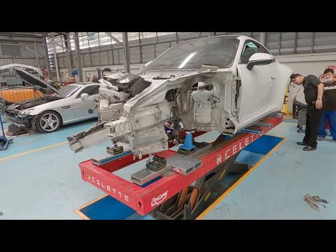 Thumbnail for Porsche 992 full front repair  on Celette inground Rhone bench and Universal Jig System Cameleon by Porsche 992