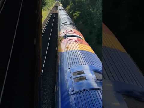 Trains go under bridges. Autism. England.