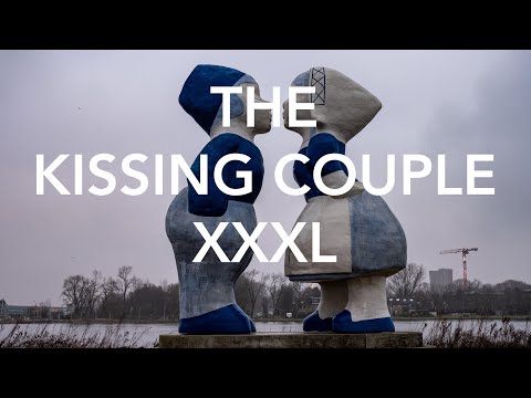 Brought my car to the garage, found a kissing couple.