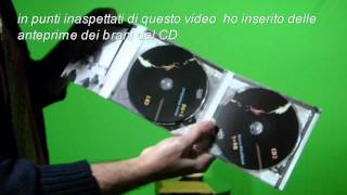 Marco Rinalduzzi unpacking double CD