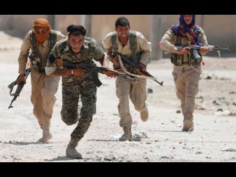 US-backed forces breach Isil stronghold Raqqa after blowing holes in city wall