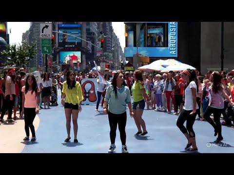 When the Flags Waved Together | Life Vest Inside Flash MOB – Times Square – Wavin’ Flag by K’naan