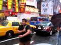 Catching A Cab In Time Square