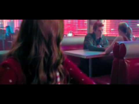 Riverdale cheryl takes a picture of betty Copper  and Archie Andrews