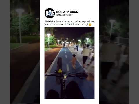 Bisiklet yoluna atlayan çocuğa çarpmaktan havalı bir hareketle kurtulan bisikletçi 😲