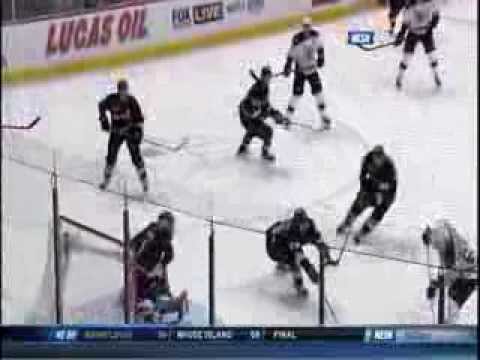 Jonas Hiller robs Brad Marchand in the blue paint