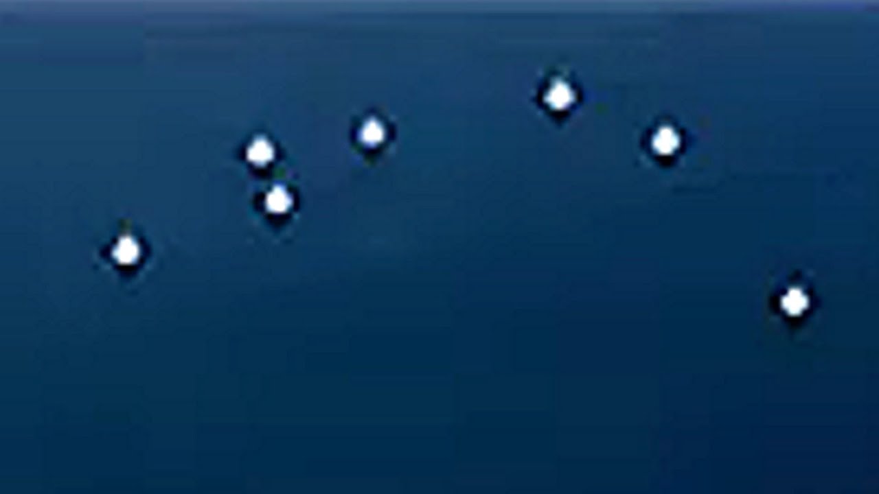 Fleet of UFOs or one massive craft with attached lights filmed during a thunderstorm.
