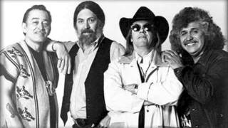 The Texas Tornados - Clinging to you