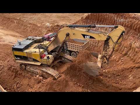Caterpillar 365C Excavator Loading Mercedes And Man Trucks