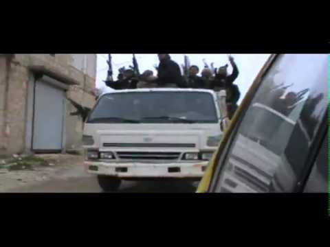 فرحة عناصر كتائب صقور الشام بعد عودتهم من احدى المعارك منتصرين في قرية سرجة في ريف إدلب