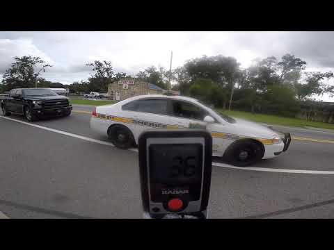 Guy Catches Cop Car Speeding In A School Zone And Things Get Uncomfortable