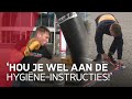 Boksschoolhouders Daan en Jens hangen bokszakken in de stad