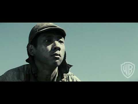 Montage from the trailer with cave interiors, dim lantern light, and cliff artillery